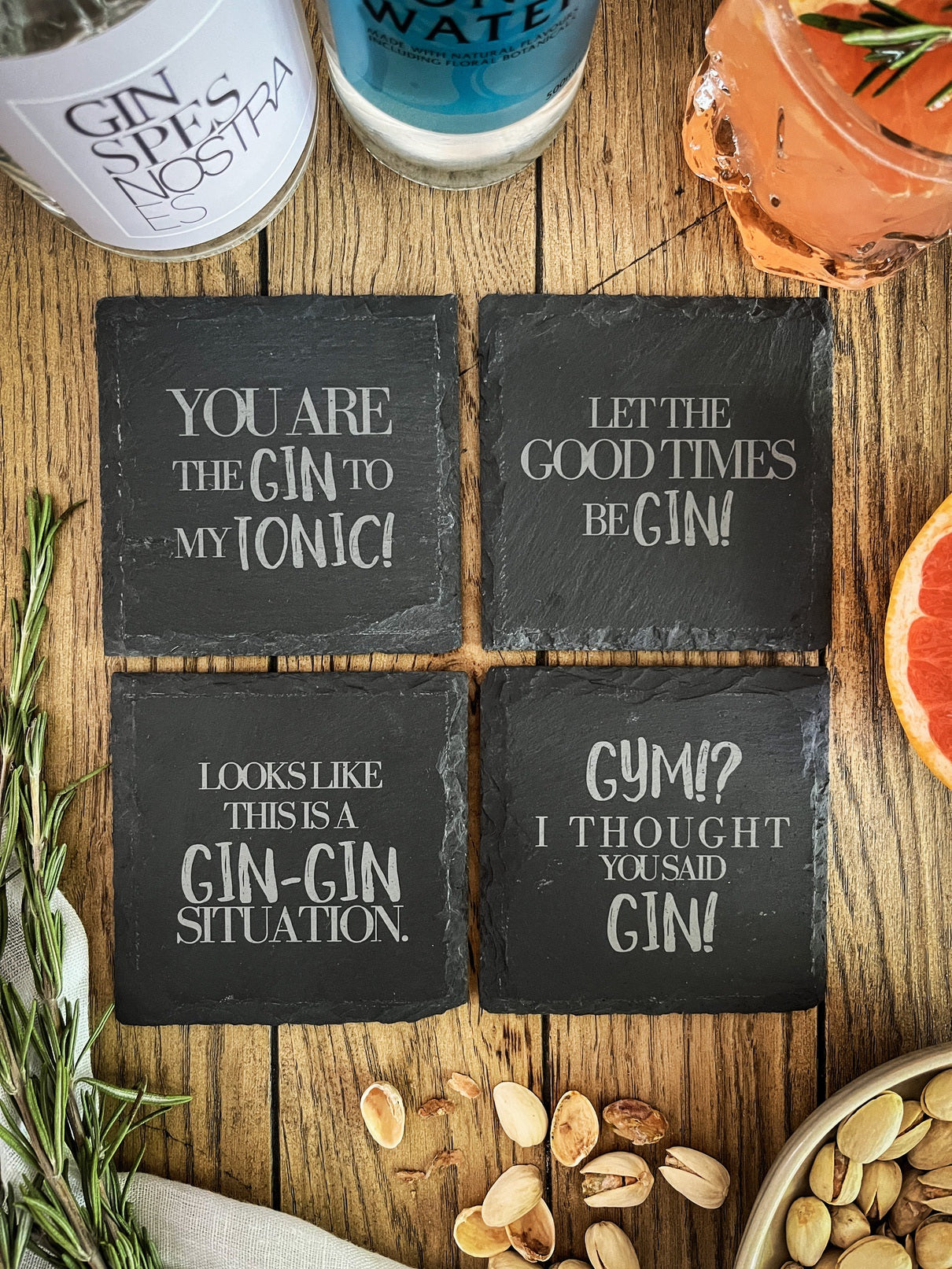 Gin-Untersetzer aus Schiefer mit versch. Motiven - 4er Set