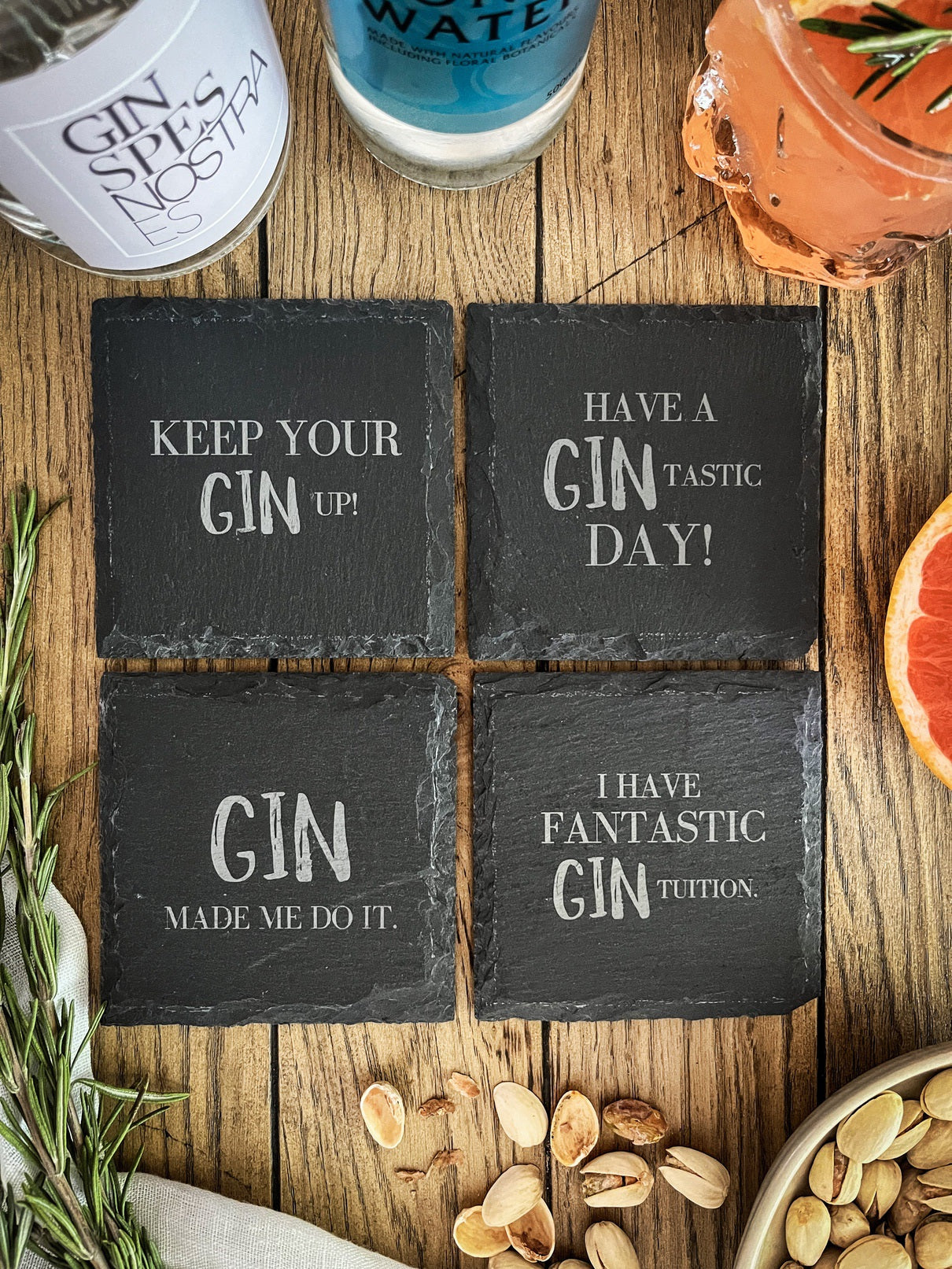 Gin-Untersetzer aus Schiefer mit versch. Motiven - 4er Set